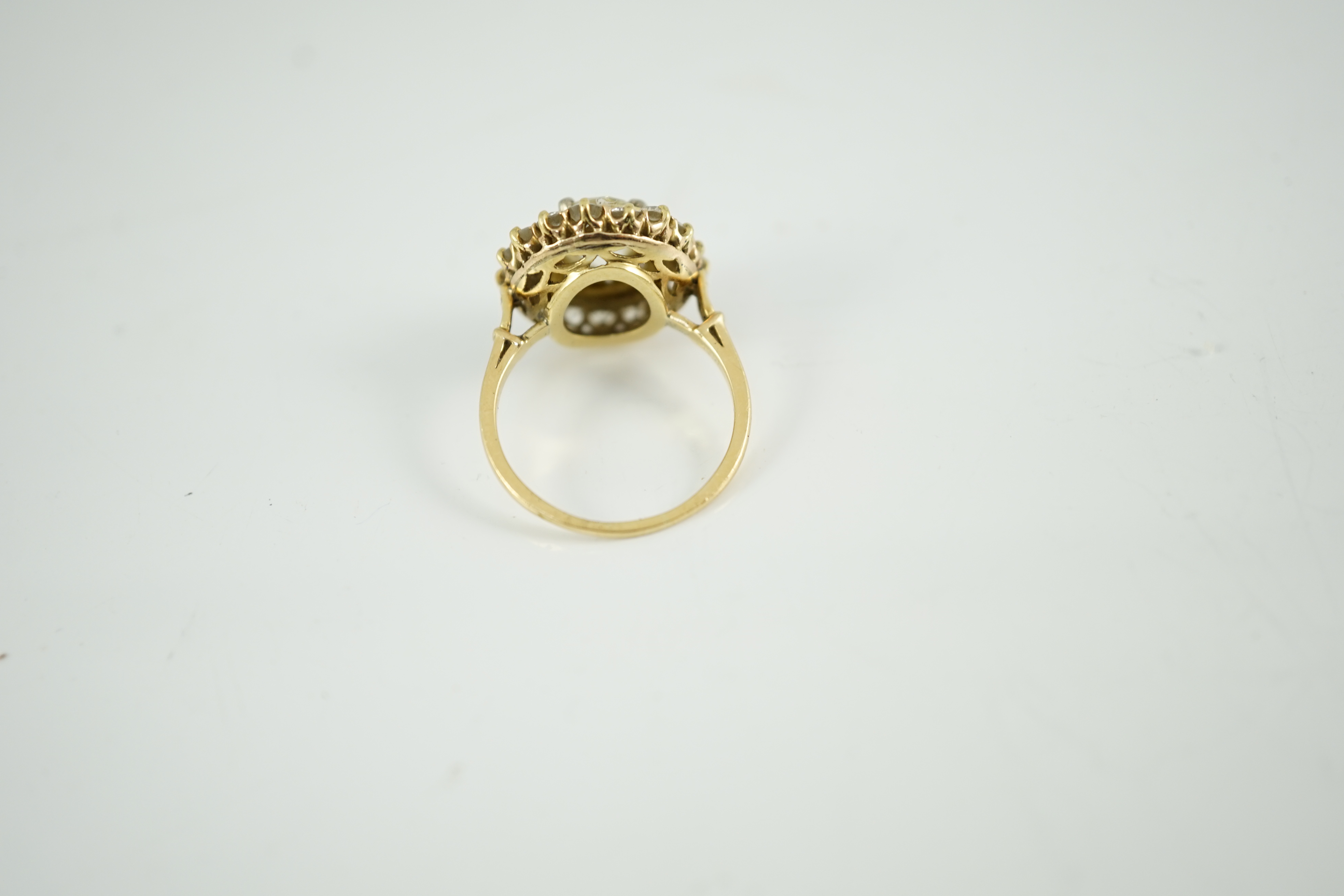 An early to mid 20th century French Van Cleef & Arpels 18ct gold and diamond set oval cluster dress ring